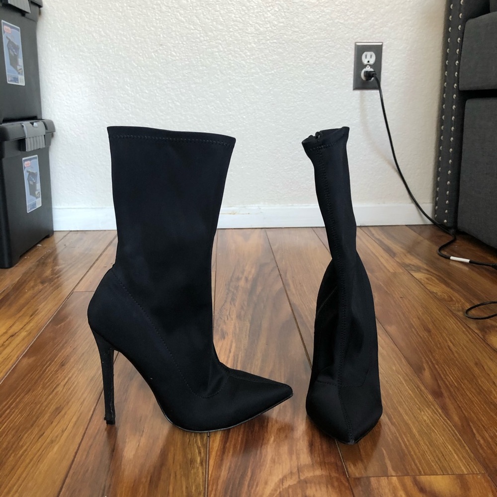 Black stiletto sock boots